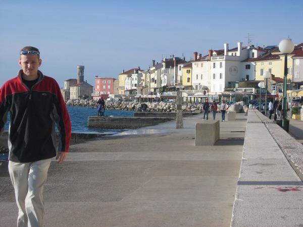 Cam wandering the coastline of Piran