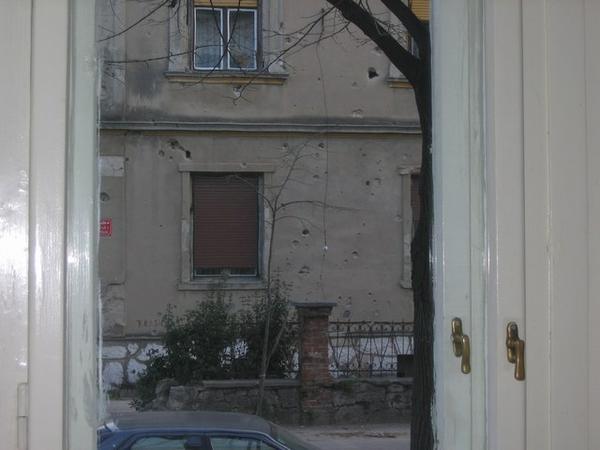 Bullet holes outside our window