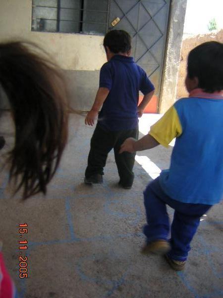Ernesto and Giovani Playing Hopscotch