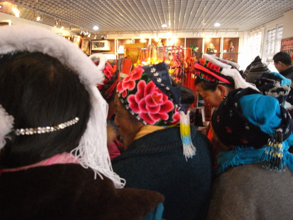Shopping in their sunday best in the Forbidden City shop
