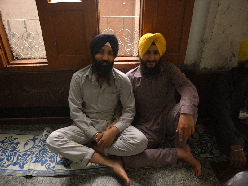 two volunteers at the Temple, having a break