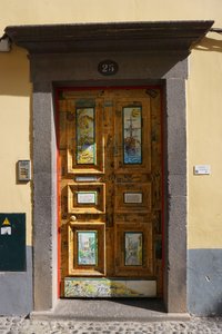 Colorful decorated doors in the old town of Funchal