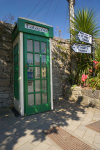 Green telephone booth in the town Cong.