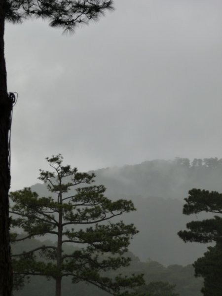 View to the mountains through the rain - Dalat