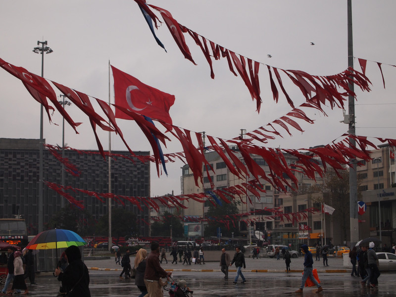 Flags at a rainy Taksim Square