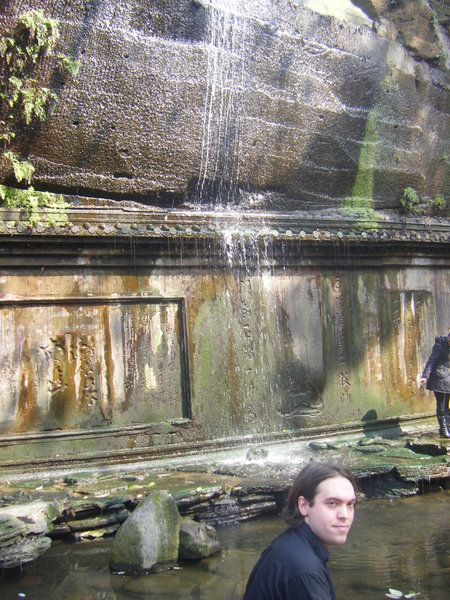 Mark by the waterfall