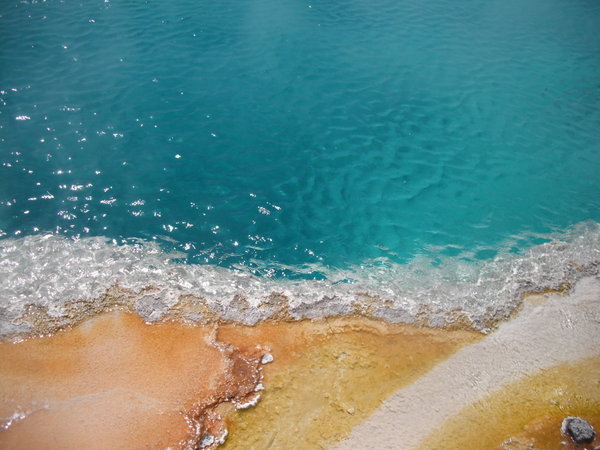The edge of a hot spring pool