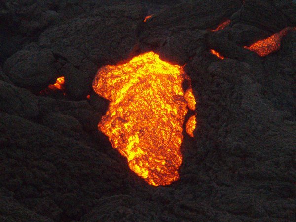 We could see the lava coming out of the ground and moving down the hill!
