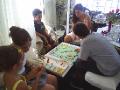The kids playing Monopoly