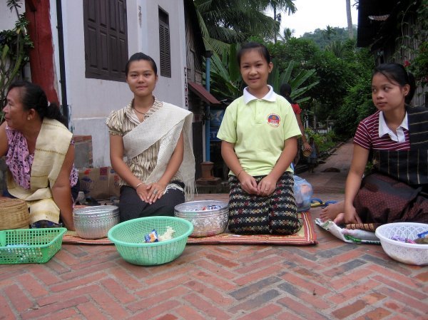 Laos Ladies Waiting for the monks