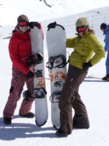 Skiers posing as snowboarders