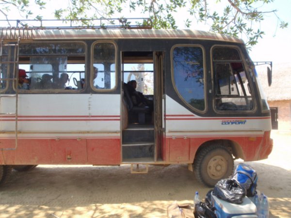 "Super Comfort" bus that ferried us from the 2nd road block to the river