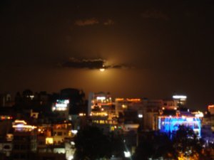 Moon rising over udaipur