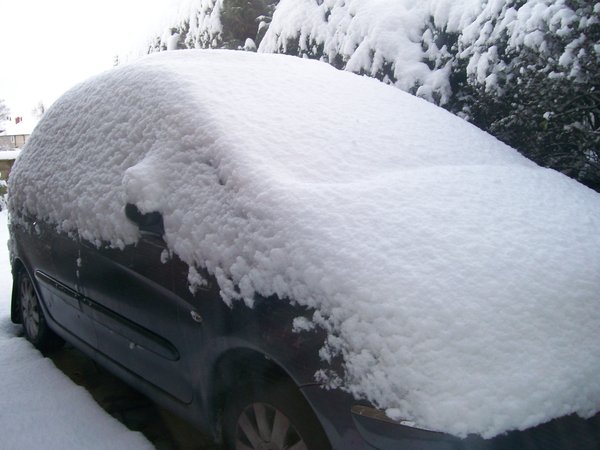 Dad's Snow Covered Car