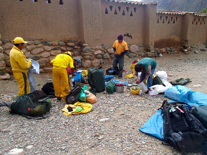 The porters packing up the gear
