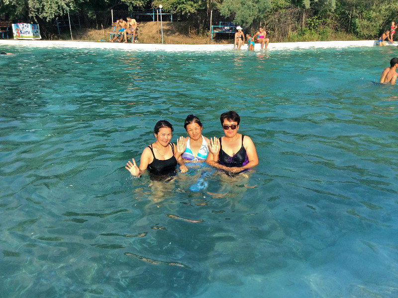 Three coworkers taking a dip