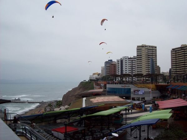 Paragliders off Miraflores cliffs