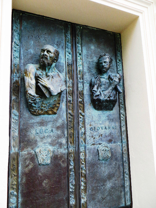 Bronze Busts of Sts. Luke and John Incorporated into the Church Doors