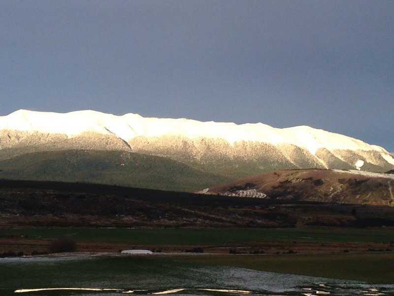 Amazing light on snow capped mountains spotted on return trip