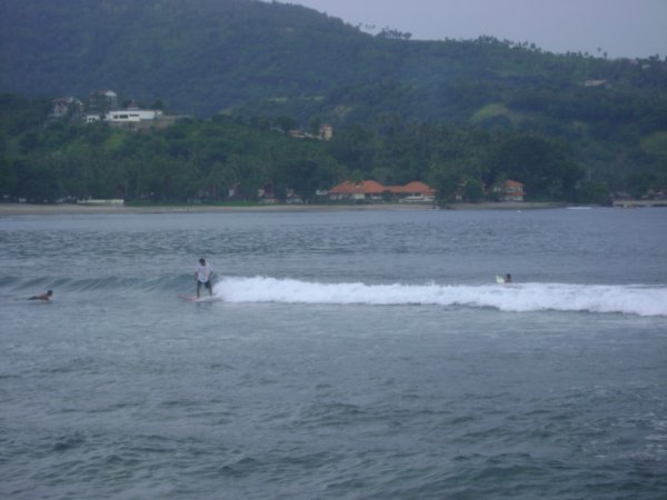Kids surfing on Lombok
