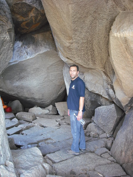 Jason walking through boulders in Hampi
