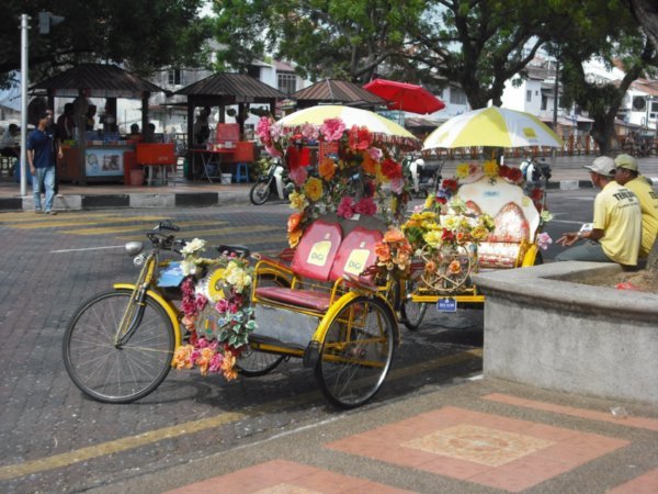 The drivers try to out-decorate all the other rickshaws