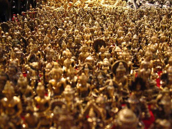 Thousands of tiny buddhist objects in the market