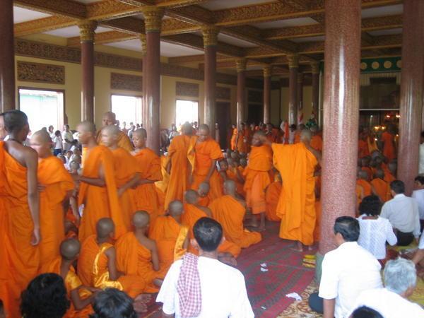 monks at a community meeting