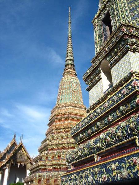 an elaborate ceramic covered chedi at the wat pho complex
