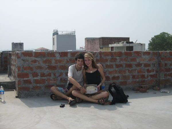 Us on The roof our hotel with the cake on Sarhas birthdayyyyy...
