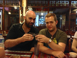 Erik and Mike drinking Rakshi at Dinner