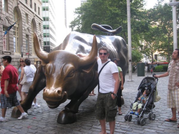 James with bull, a symbol of the financial district on Wall Street