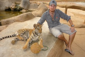James playing with the tiger
