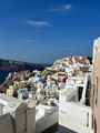 Another view of Oia with yellow and coral houses