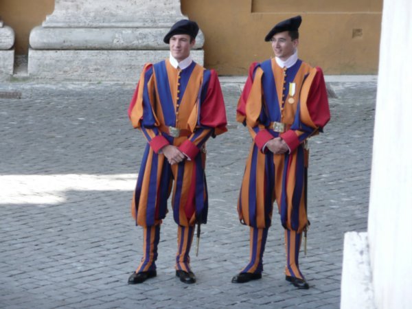Handsome Swiss guards dressed in Michelangelo's fashion design