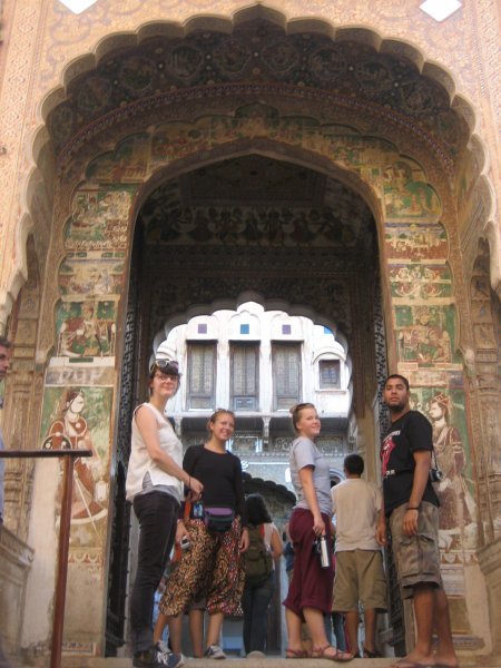 friends entering the Haveli