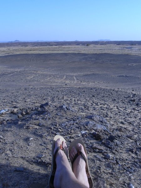 lying on the desert