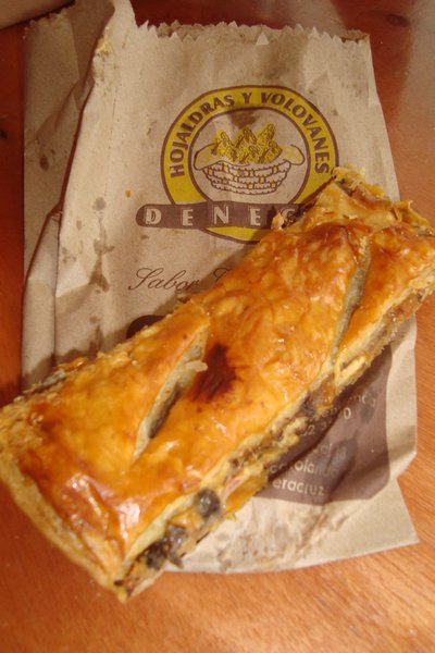 A mexican pastry with cheese and chillies