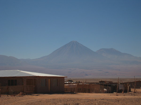 A large volcano in the distance