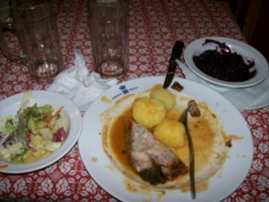 my food: suckling pig, potatoes, and ret kraut