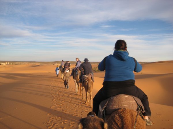 Camel riding in the Sahara