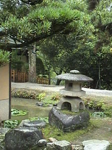 stone lantern and pond