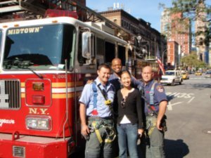 jean with local firemen - paul has never seen her so happy