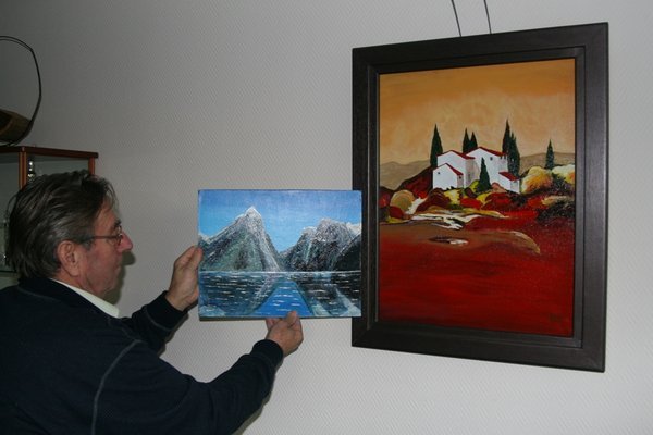 Oom Dirk with more of his paintings