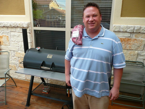 Geoff owns three grills.  I guess that's why he walks around with meat hanging on his shoulder.