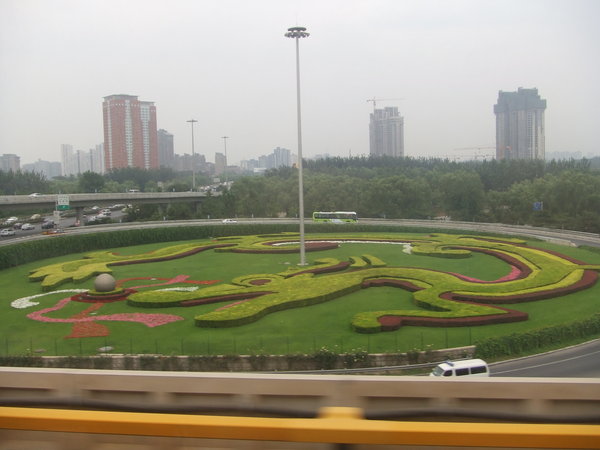 Lawn Art in the Middle of a Highway Intersection near an outter ring road