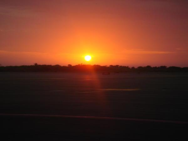 The big round sun rise at the airport