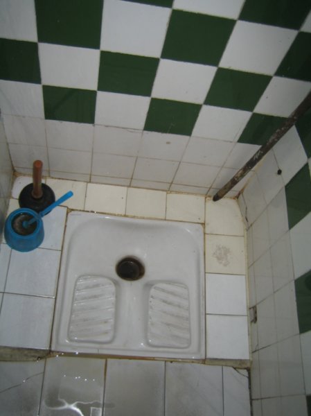 Moroccan 'toilet'=hole in the ground. I realized that I needed to position myself so as not to splatter pee all over my shoes!