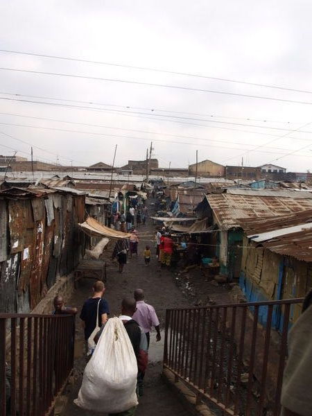 Walking through the slums on the way to the school