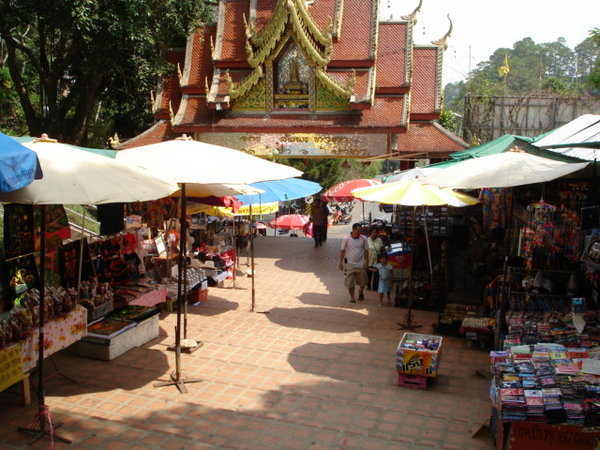 The market tables outside the temple.